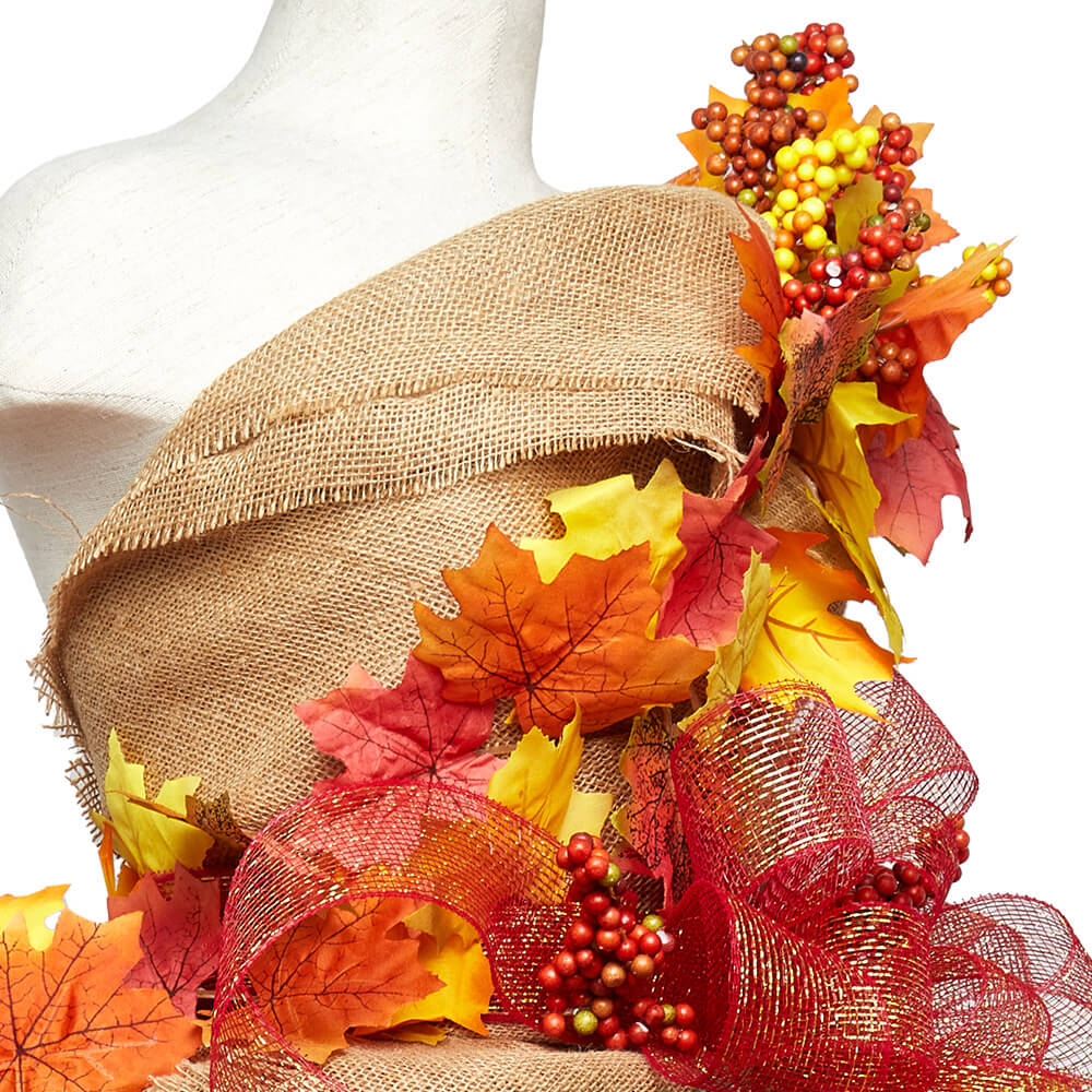 side view of a bodice made from Paper Mart burlap fabric and embellished by berries and leaves